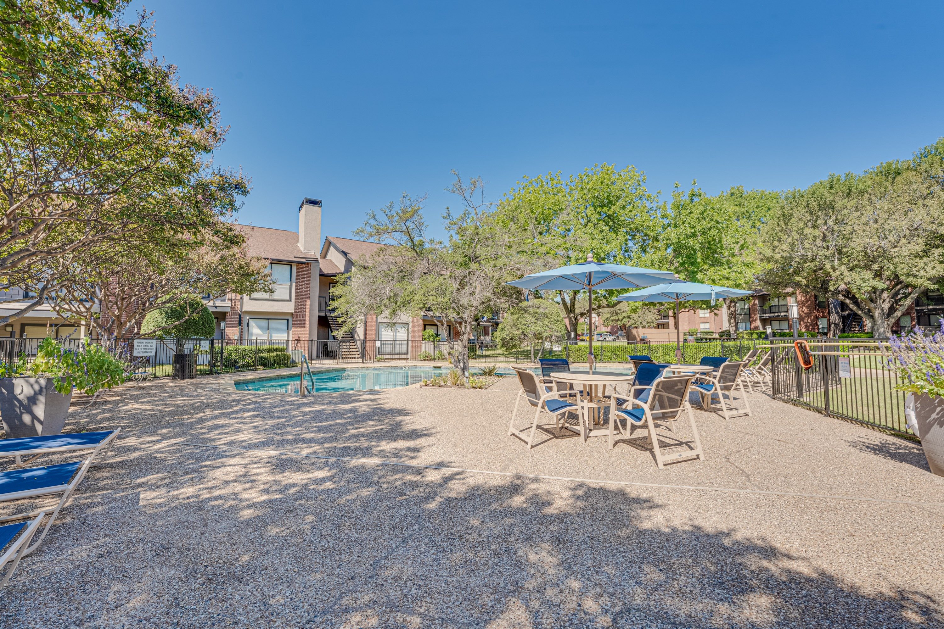 Backyard with a pool at Bardin Oaks Apartments, Arlington, 76018